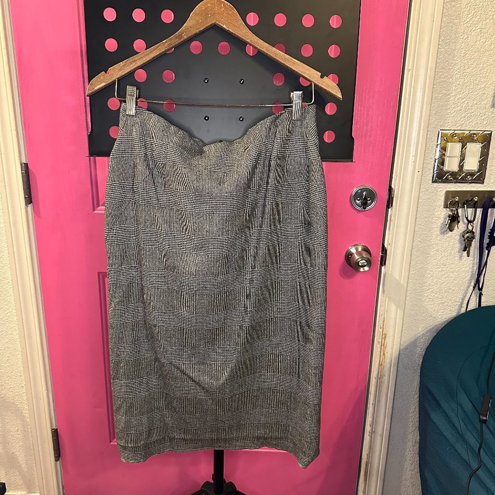 Escada- Pencil skirt, grey with black and white plaid. Damaged hem in the front.
